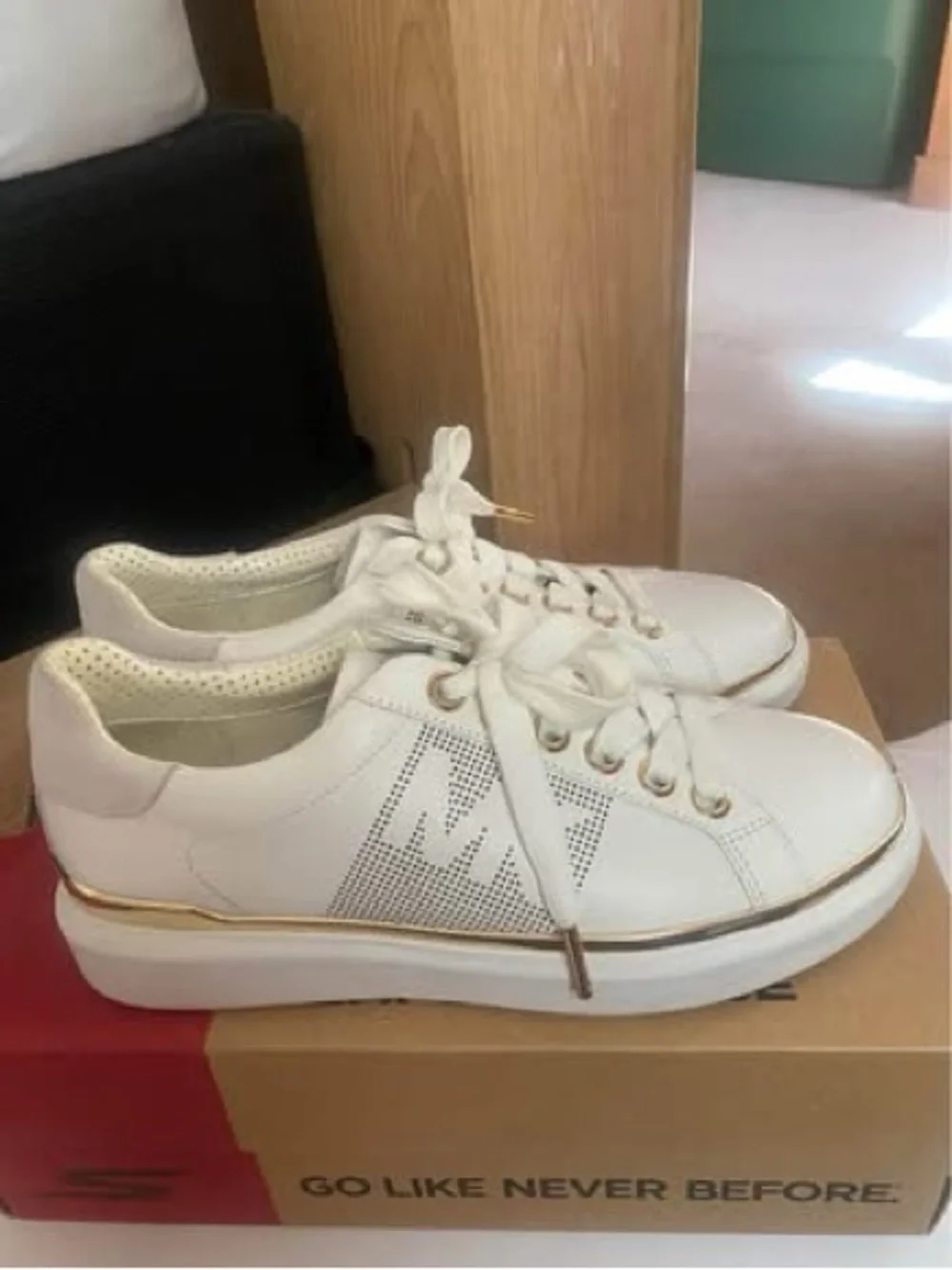 Women’s size 7 Michael Kors Sneakers with Gold Trim